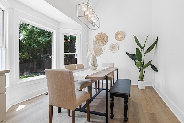 2020 Piper Dr, Charleston, SC 29407 - dining room with plenty of natural light, light wood-type flooring, and a chandelier