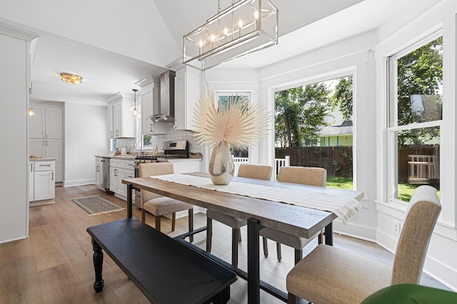 2020 Piper Dr, Charleston, SC 29407 - dining room featuring healthy amount of natural light, hardwood / wood-style floors, and a chandelier