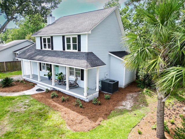 2020 Piper Dr, Charleston, SC 29407 - view of property exterior with a shingled roof, a chimney, a porch, and an attached garage