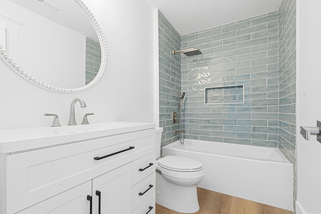 2020 Piper Dr, Charleston, SC 29407 - full bath featuring wood finished floors, vanity, and tub / shower combination
