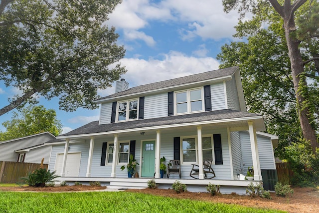 2020 Piper Dr, Charleston, SC 29407 - view of front facade featuring covered porch, a chimney, and a garage