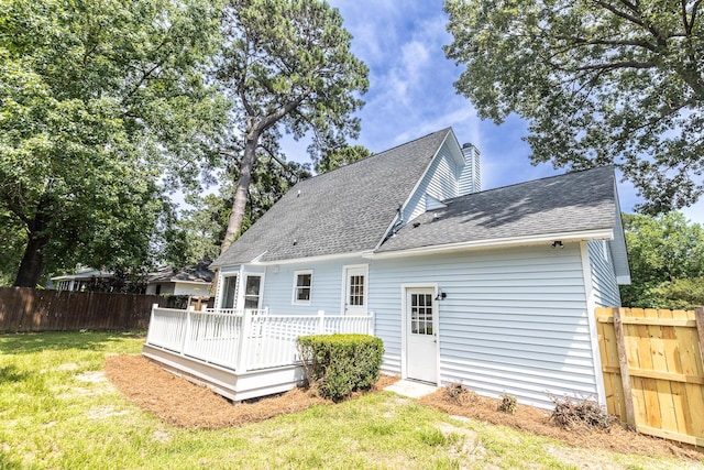 2020 Piper Dr, Charleston, SC 29407 - rear view of property with a chimney, roof with shingles, and a deck