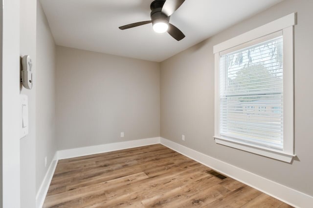 unfurnished room featuring ceiling fan and light hardwood / wood-style floors