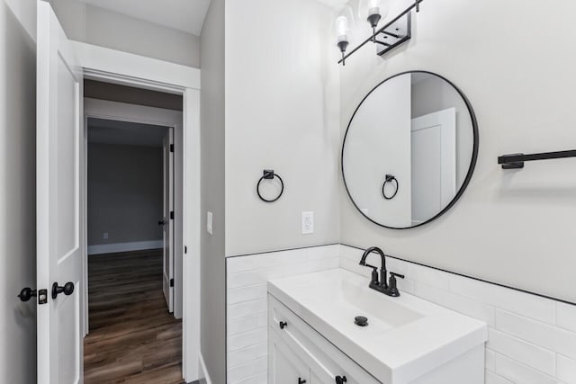 bathroom featuring vanity and hardwood / wood-style floors