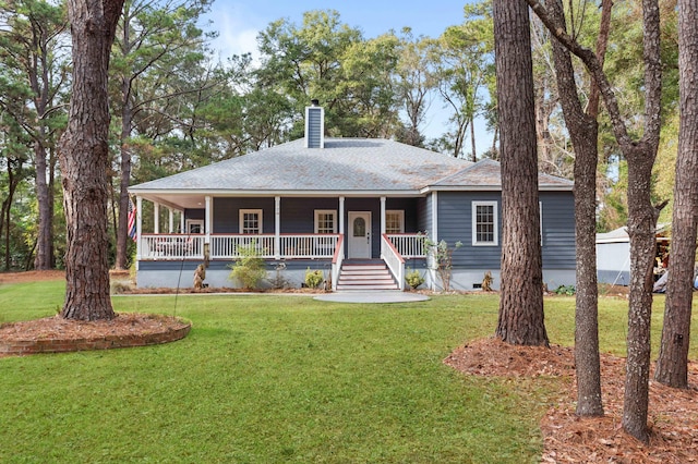 view of front of house featuring a front yard and a porch