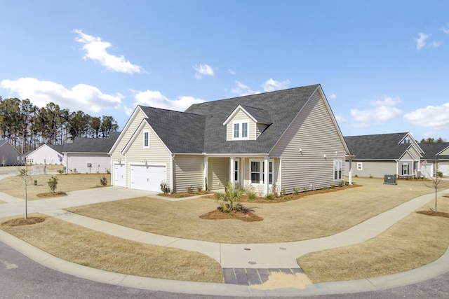 cape cod-style house with a garage