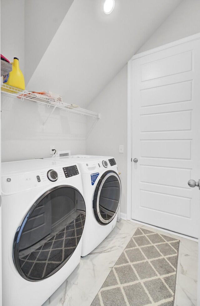 washroom with washing machine and dryer