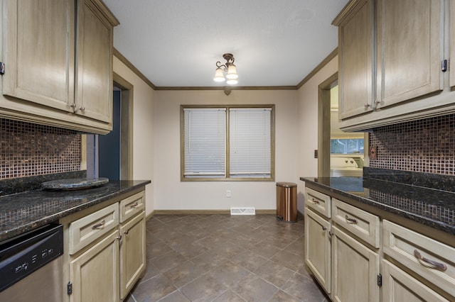 kitchen with tasteful backsplash, dark stone countertops, crown molding, and dishwasher