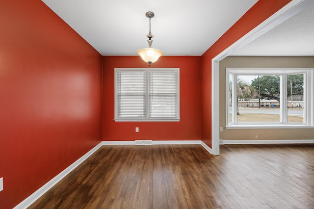 unfurnished room featuring hardwood / wood-style floors