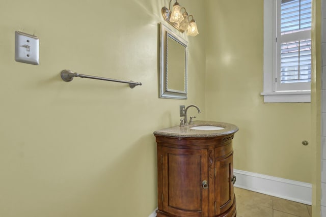 bathroom with tile patterned floors and vanity