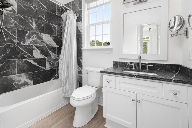 861 Center Park St, Charleston, SC 29492 - full bathroom featuring vanity, toilet, shower / tub combo with curtain, and wood finished floors