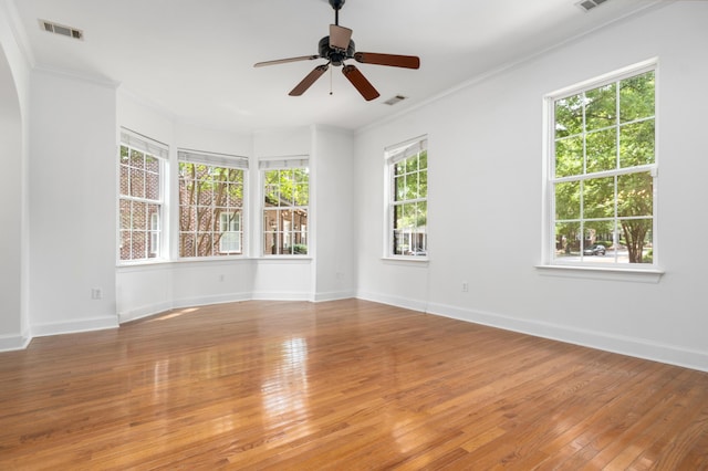 861 Center Park St, Charleston, SC 29492 - empty room with light wood finished floors, a ceiling fan, ornamental molding, and baseboards