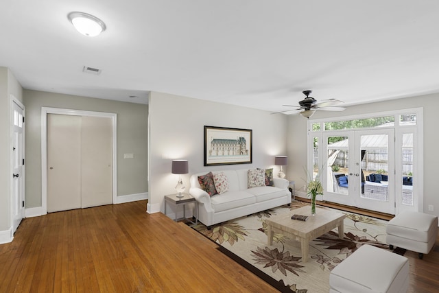 2404 Menola Ave, Charleston, SC 29414 - living area with ceiling fan, baseboards, wood finished floors, and french doors