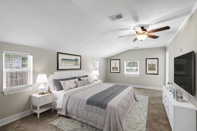 2404 Menola Ave, Charleston, SC 29414 - bedroom with multiple windows, a ceiling fan, vaulted ceiling, baseboards, and tile patterned flooring
