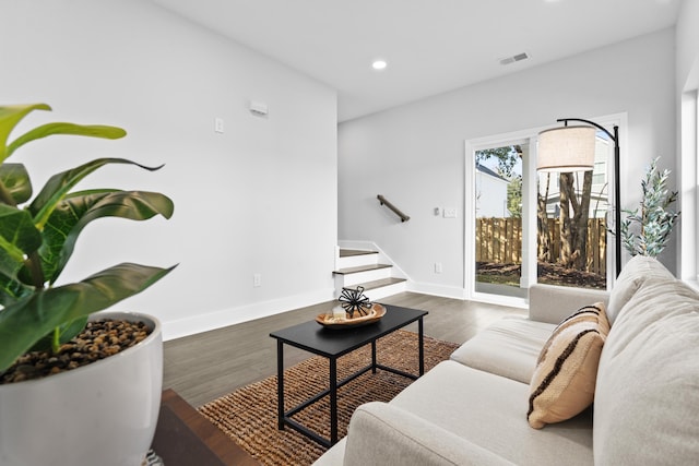 living room featuring dark hardwood / wood-style floors