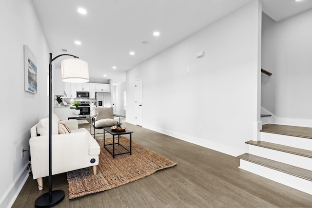 living room featuring dark hardwood / wood-style floors