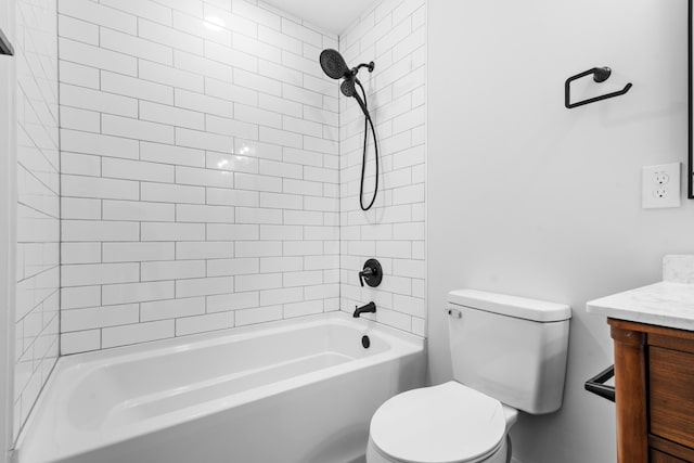 full bathroom with vanity, toilet, and tiled shower / bath