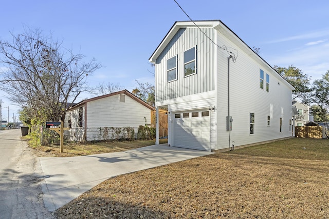 exterior space with a lawn and a garage