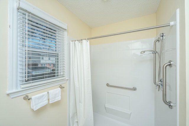 bathroom featuring a textured ceiling