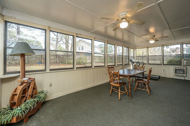 sunroom / solarium with heating unit and ceiling fan