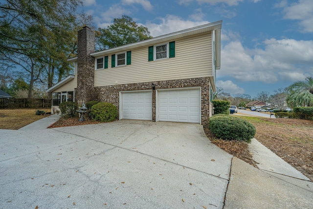 view of home's exterior with a garage