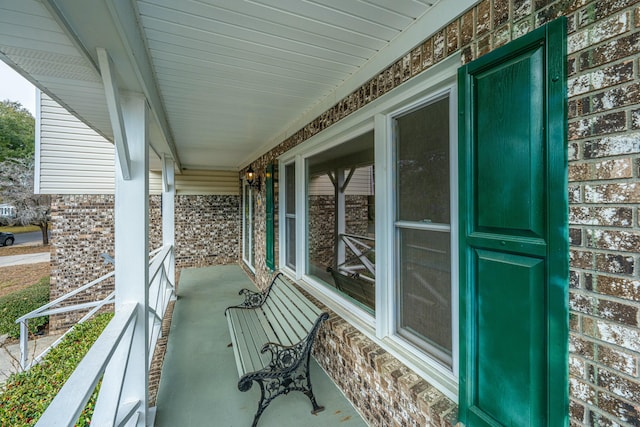 balcony featuring a porch