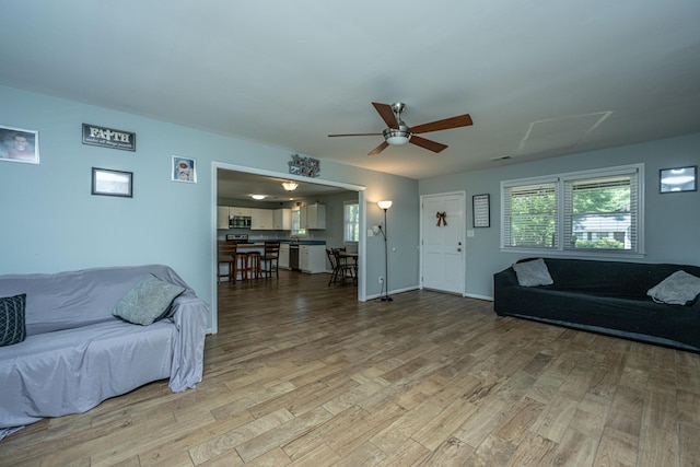 565 Estates Dr, Walterboro, SC 29488 - living area with ceiling fan and light wood-style flooring
