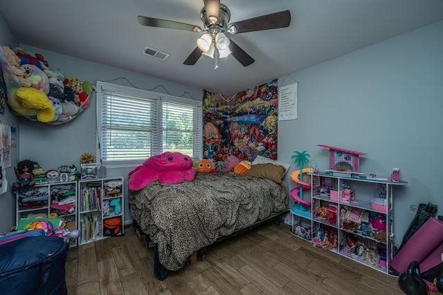 565 Estates Dr, Walterboro, SC 29488 - bedroom with wood finished floors and a ceiling fan