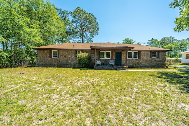 565 Estates Dr, Walterboro, SC 29488 - ranch-style house featuring a front lawn, brick siding, and covered porch