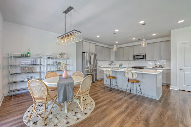 175 Darby Meadow Ln, Ridgeville, SC 29472 - dining area featuring wood finished floors, recessed lighting, and a chandelier