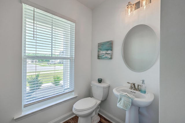 175 Darby Meadow Ln, Ridgeville, SC 29472 - bathroom featuring toilet, wood finished floors, and baseboards