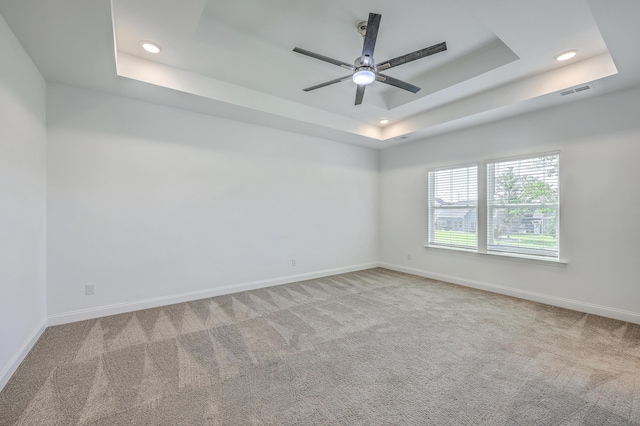 175 Darby Meadow Ln, Ridgeville, SC 29472 - carpeted empty room featuring a raised ceiling, ceiling fan, baseboards, and recessed lighting