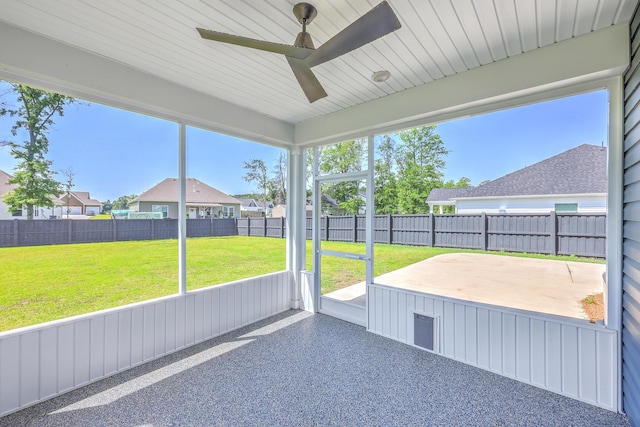 175 Darby Meadow Ln, Ridgeville, SC 29472 - unfurnished sunroom with a ceiling fan and a residential view