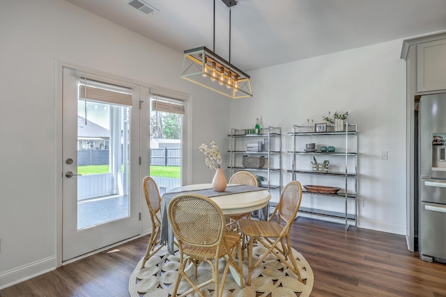 175 Darby Meadow Ln, Ridgeville, SC 29472 - dining room featuring dark wood-style flooring, a chandelier, and baseboards