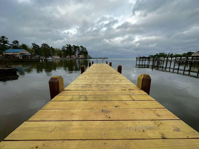 view of dock with a water view