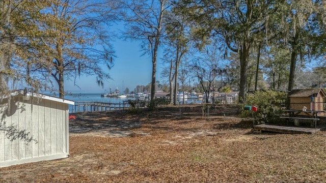 view of yard with a water view