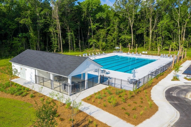 view of swimming pool with a patio area