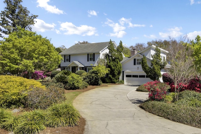 view of front of home featuring a garage and concrete driveway
