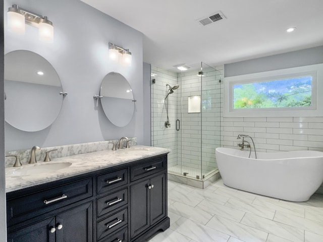 1410 Diamond Blvd, Mount Pleasant, SC 29466 - full bath with a shower stall, a freestanding bath, marble look tile flooring, and double vanity