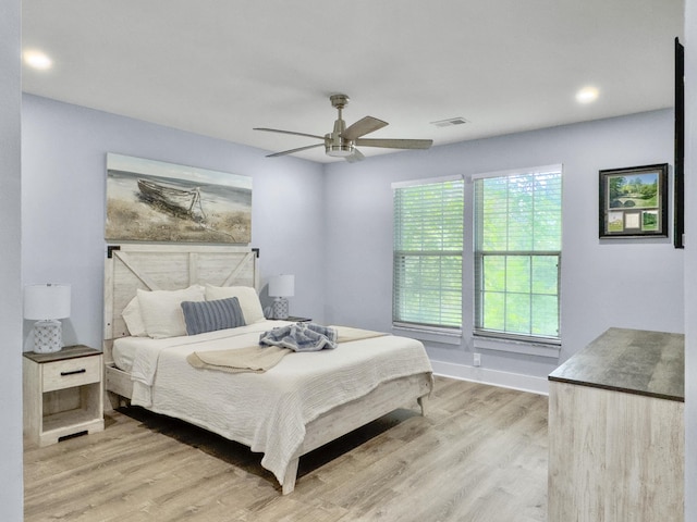 1410 Diamond Blvd, Mount Pleasant, SC 29466 - bedroom featuring light wood finished floors and ceiling fan