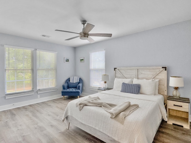 1410 Diamond Blvd, Mount Pleasant, SC 29466 - bedroom with wood finished floors and a ceiling fan