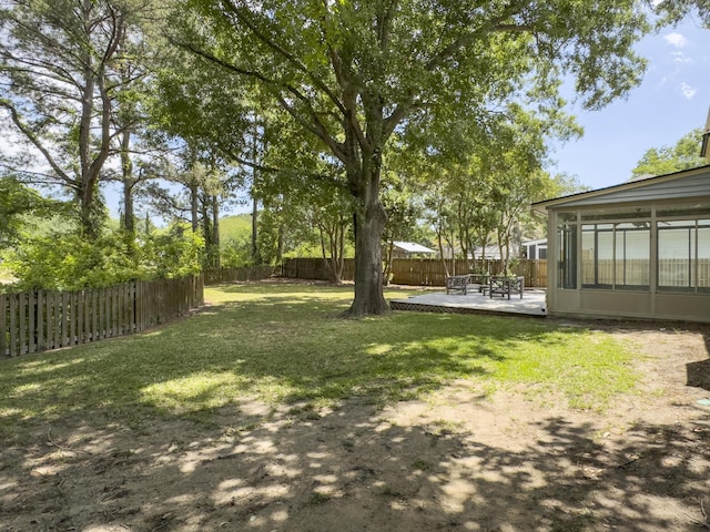 1410 Diamond Blvd, Mount Pleasant, SC 29466 - fenced backyard featuring a patio and a sunroom