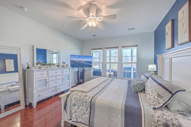 bedroom featuring hardwood / wood-style floors and ceiling fan