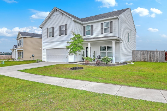 traditional-style home featuring a garage, a front lawn, fence, covered porch, and concrete driveway