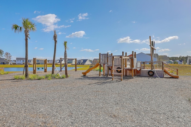 community play area featuring a water view and a residential view