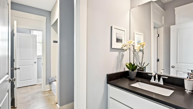 bathroom featuring tile patterned floors and vanity