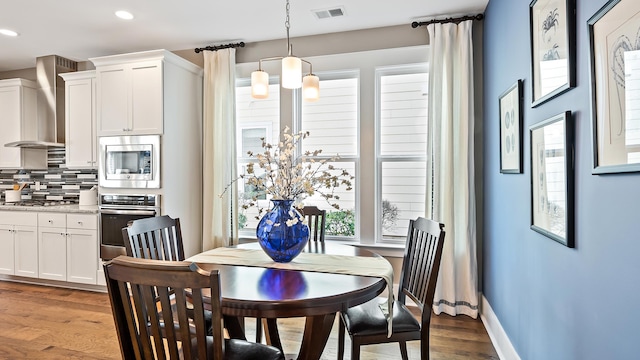 dining room featuring hardwood / wood-style floors