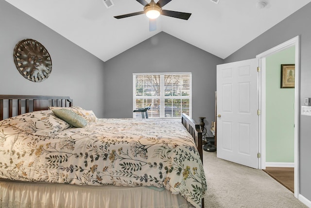 bedroom featuring lofted ceiling, ceiling fan, and carpet