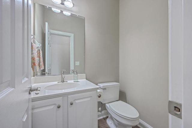 401 Waring St, Summerville, SC 29483 - bathroom featuring vanity, toilet, and baseboards