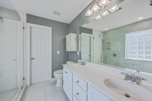 401 Waring St, Summerville, SC 29483 - full bathroom featuring visible vents, a shower stall, toilet, and a sink